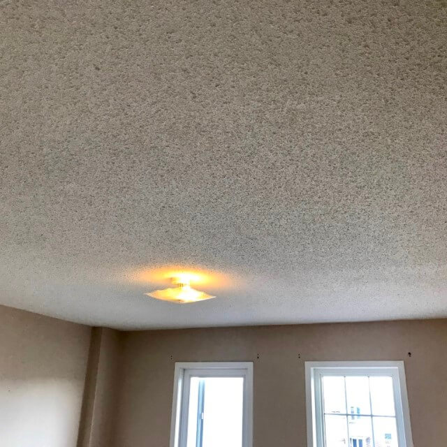 Image depicts a popcorn ceiling from Arkadys Painting's popcorn ceiling removal project in Whitby.