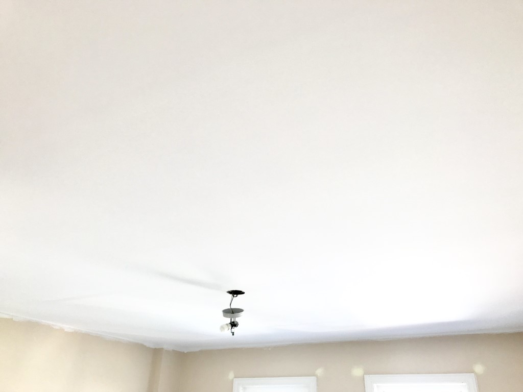Image depicts a new ceiling from Arkadys Painting's popcorn ceiling removal project in Whitby.