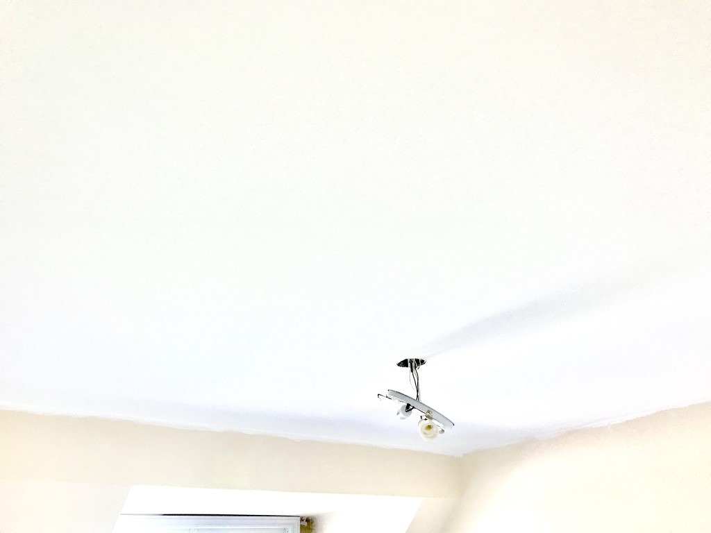 Image depicts a new ceiling from Arkadys Painting's popcorn ceiling removal project in Whitby.
